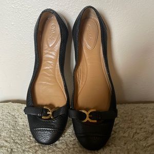 Chloé black leather flats with gold buckle detail